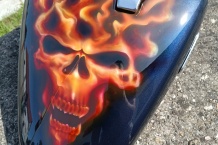 Airbrush gastank skull on fire.