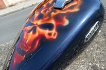 Airbrush gastank skull on fire.