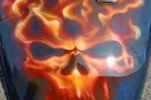 Airbrush gastank skull on fire.